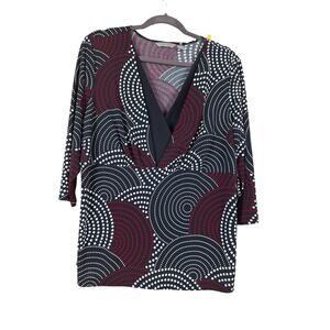 Women's blouse size XL 92%polyester  8%spandex  machine wash brand Investment